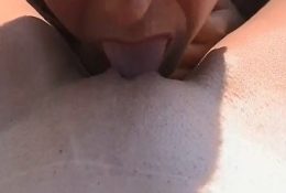 Masturbation and licking cunt on the beach
